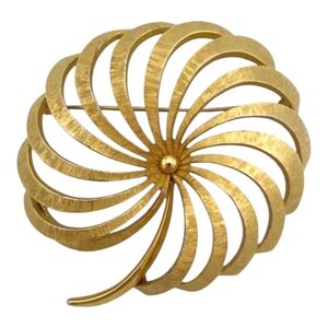 Vintage Monet Brushed Gold Tone Spiral Brooch with Mid-Century Design